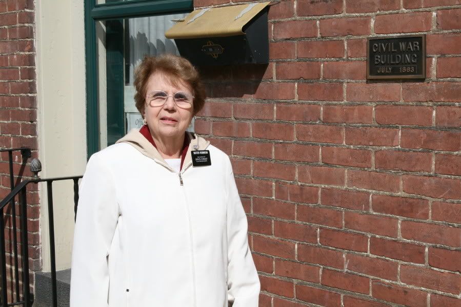 Sister Robinson in front of her house in Gettysburg