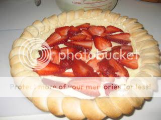 Spread half the filling in pastry and top with 1 cup strawberries