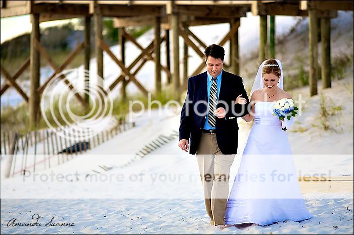 bride walking down the aisle on the beach